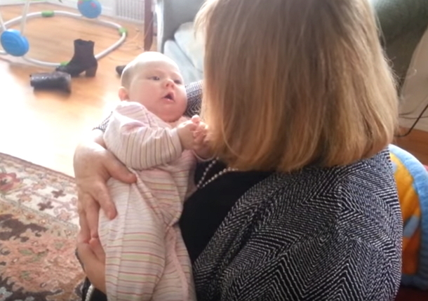 mom sings to baby